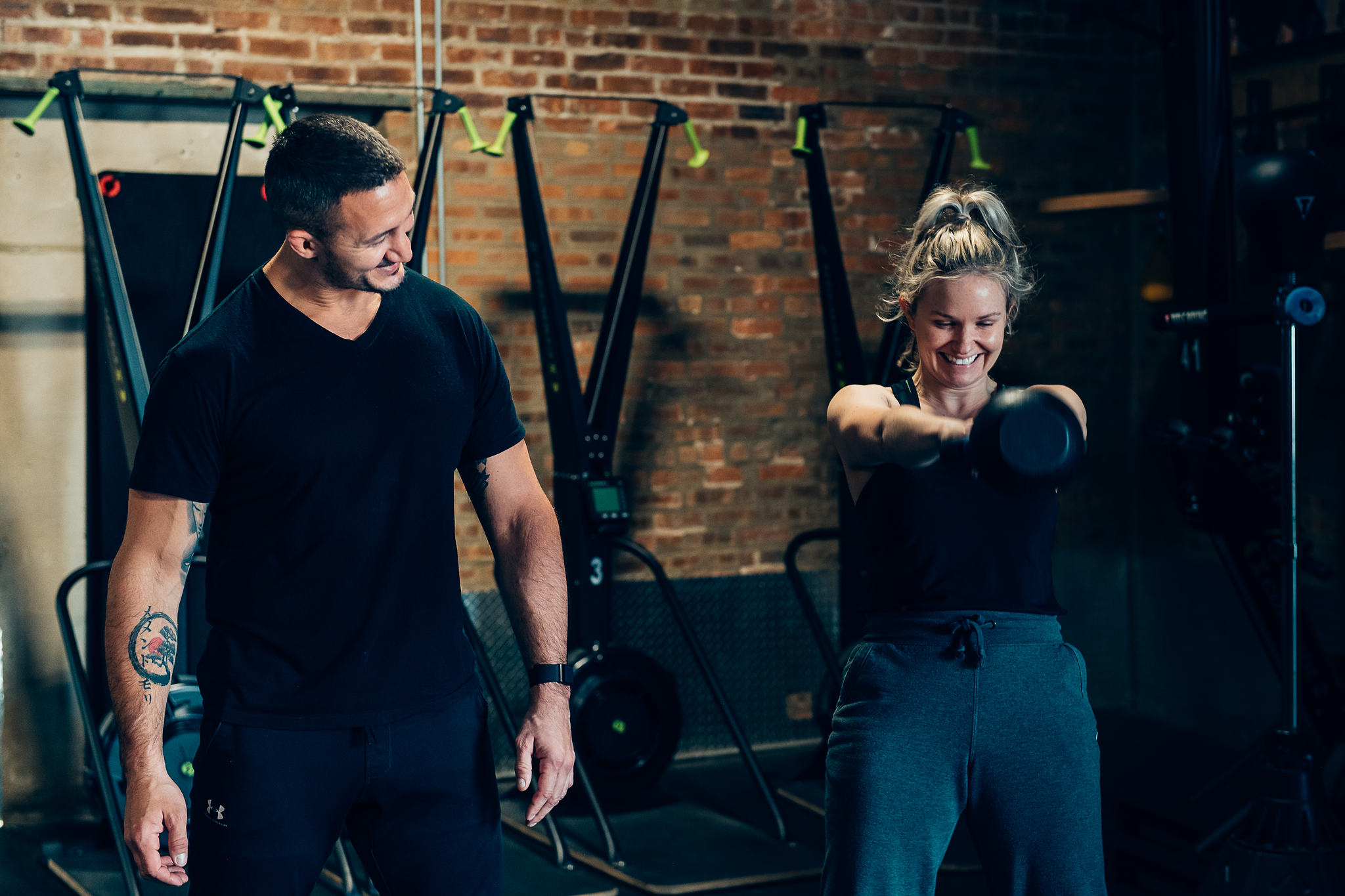 Lukasz coaching a smiling client